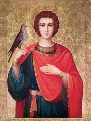 "Icon of a saint holding a small bird, dressed in a red and green robe, with a golden halo surrounding his head